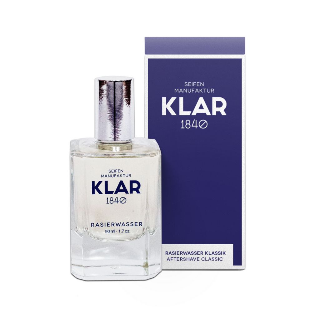 Flakon und Verpackung von Rasierwasser. Aufschrift: KLAR 1840, Rasierwasser Klassik. Flakon mit silbernem Verschluss.