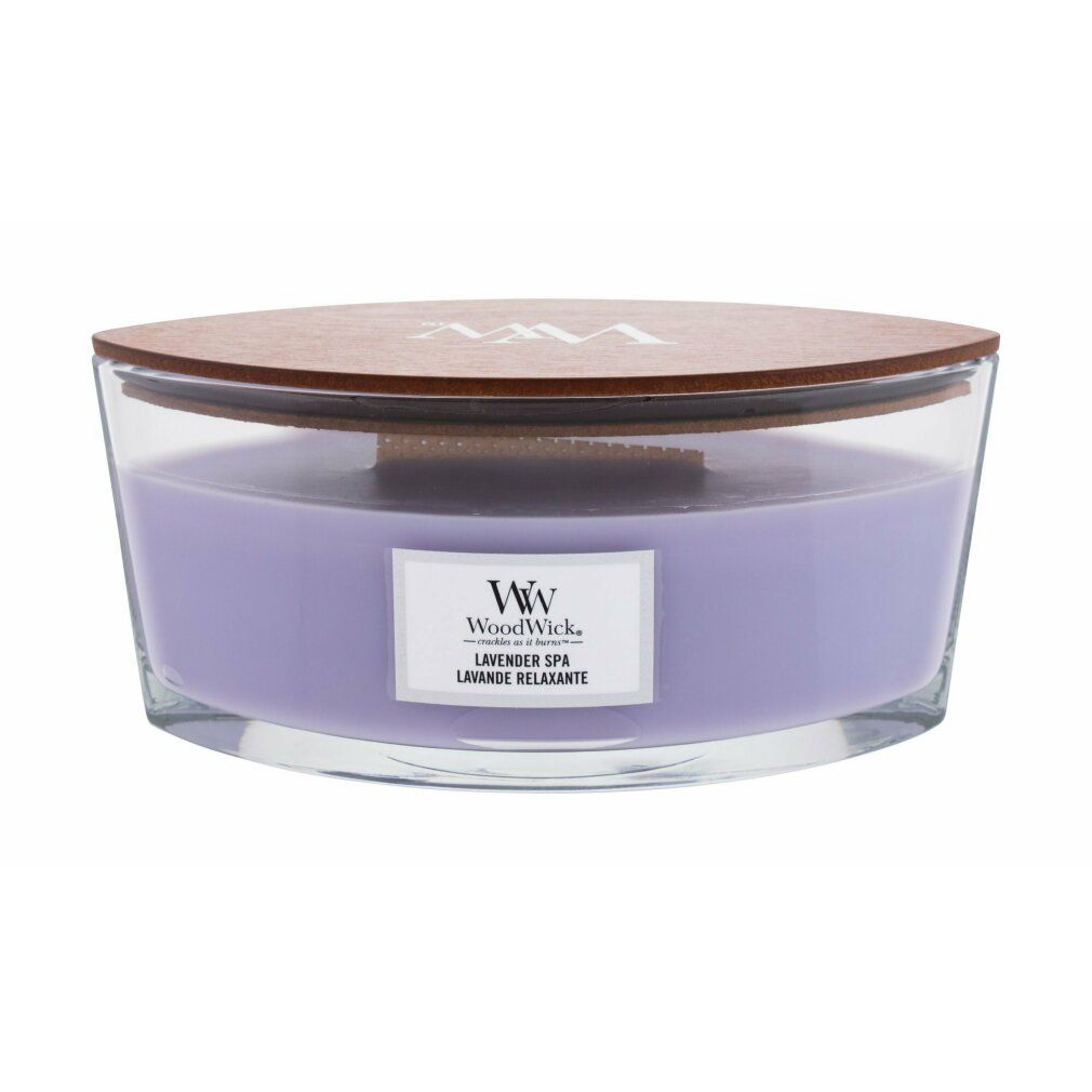 Ellipsenförmige Kerze mit Holzdeckel. Lila Wachs in Glasbehälter. Aufschrift: WoodWick, Lavender Spa, Lavande Relaxante.