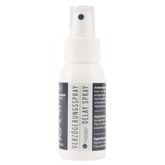 Weiße Sprühflasche mit schwarzem Etikett. Beschriftung: Verzögerungsspray, Delay Spray. Sprühkopf oben.
