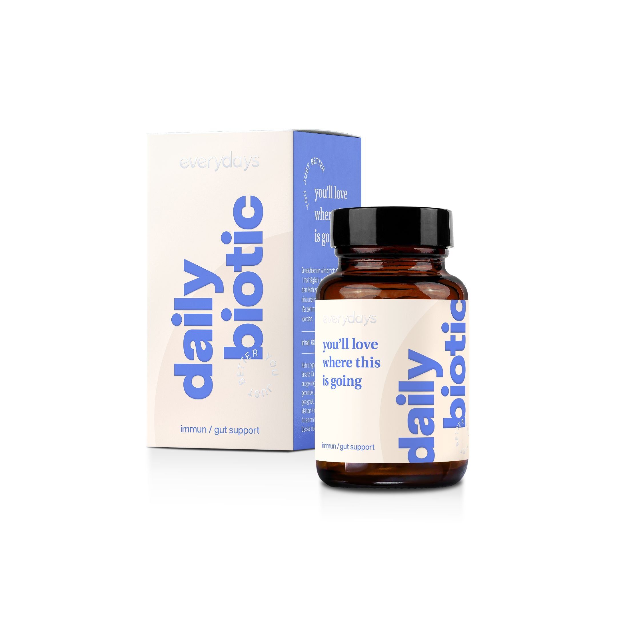 Eine Flasche 'daily biotic' und ihre Verpackung auf weißem Hintergrund.