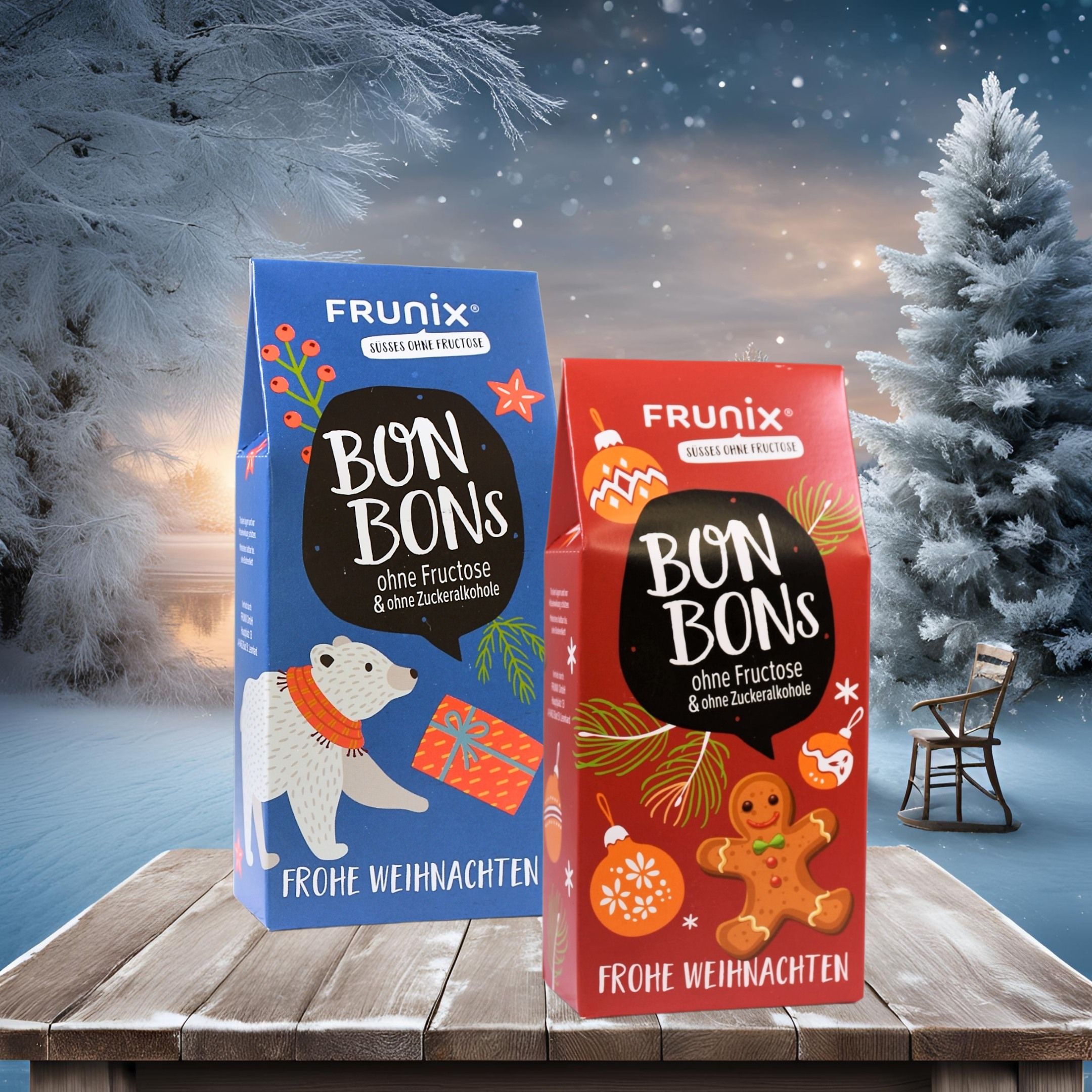 Zwei Bonbon-Verpackungen auf einem Holztisch vor Winterlandschaft. Blaue und rote Verpackung. Text: "BON BONS", "Frohe Weihnachten".
