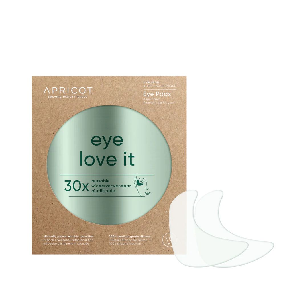 Verpackung mit Augenpads. Marke APRICOT. Aufschrift: eye love it, 30x, wiederverwendbar. Zwei Pads liegen daneben.