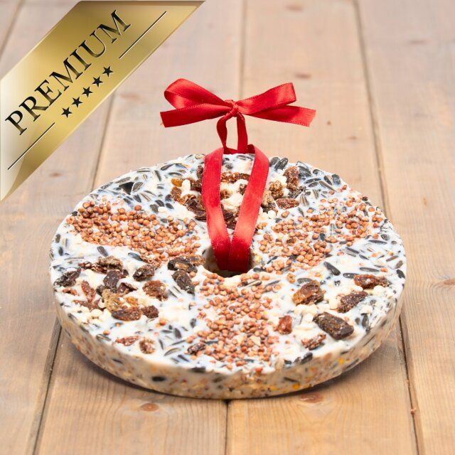 Runder Vogelfuttertaler mit roter Schleife. Goldene Plakette: PREMIUM, 5 Sterne.