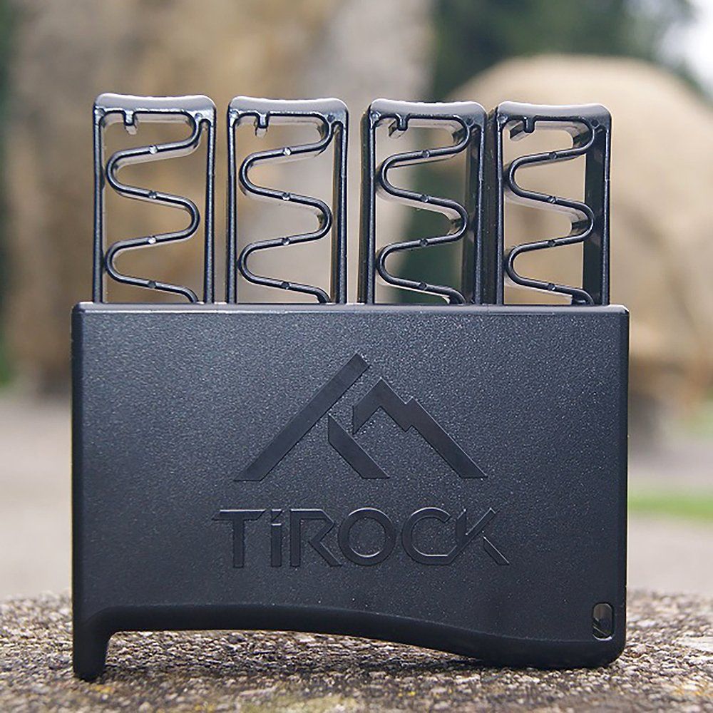 Schwarzes Fingertrainer-Set Ti-Hand. Vier Federn stecken in einem Basis-Element mit TiRock-Logo.