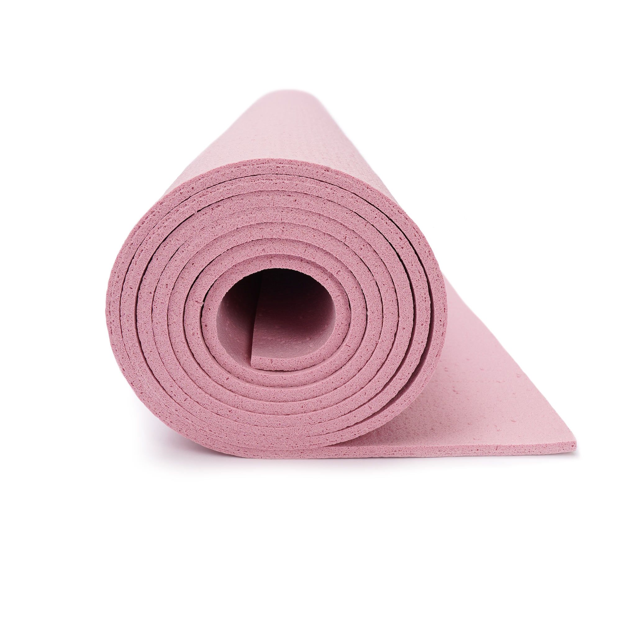 Gerollte rosa Yogamatte mit strukturierter Oberfläche.