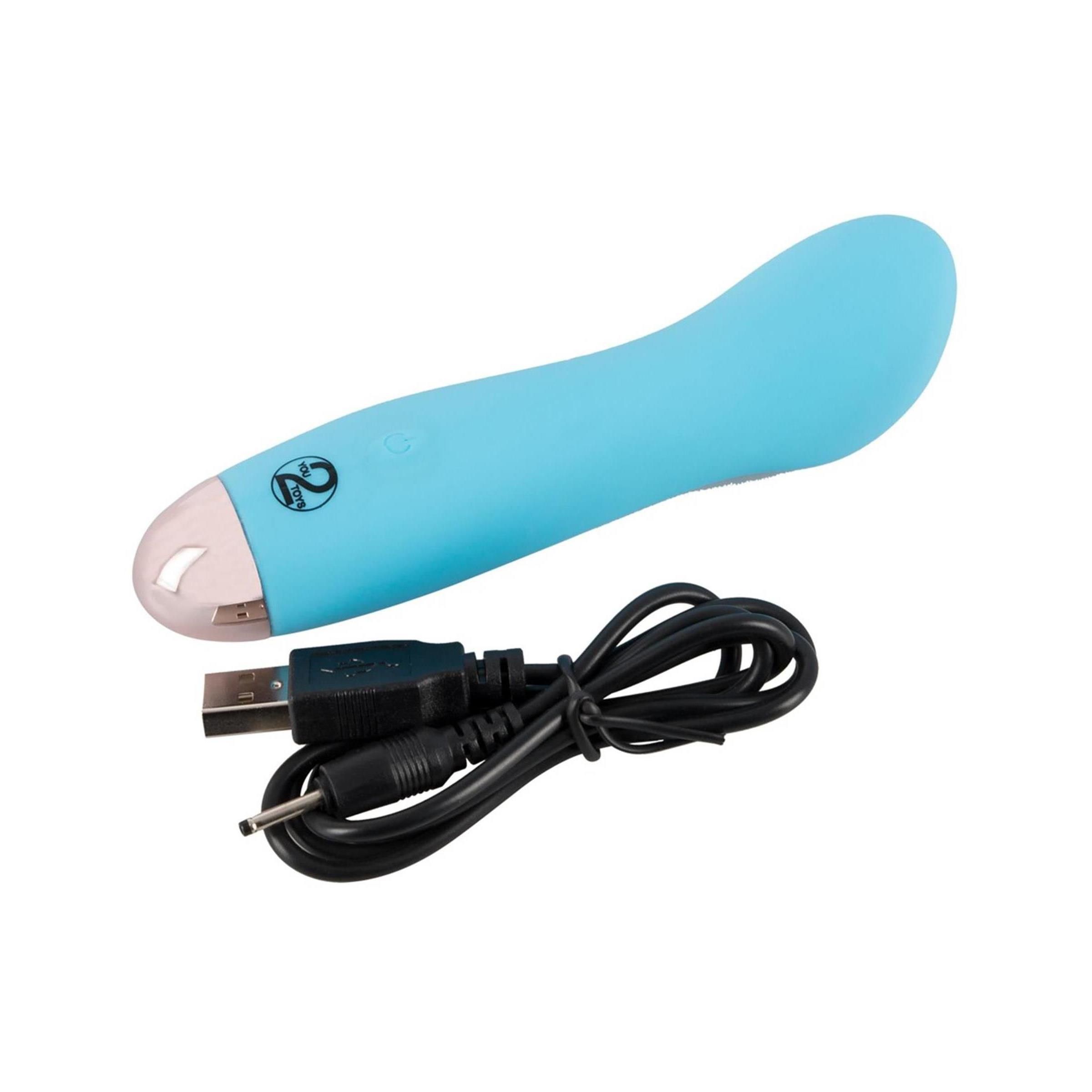 Türkisfarbener Vibrator mit USB-Ladekabel. Rosa Spitze.
