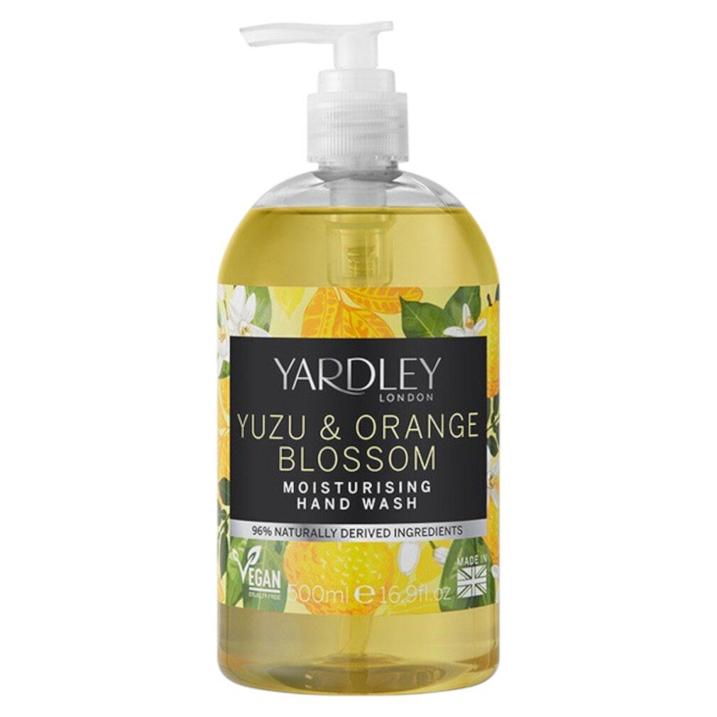 Flüssigseife mit Etikett. Aufschrift: Yuzu & Orange Blossom. Mit Spender. Gelbe Flüssigkeit sichtbar. Vegan.