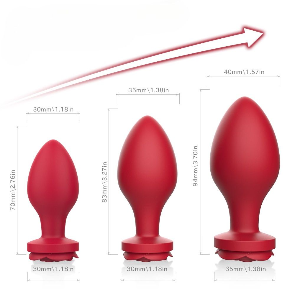Drei rote Analplugs mit Größenangaben in Zoll. Die Größen variieren.