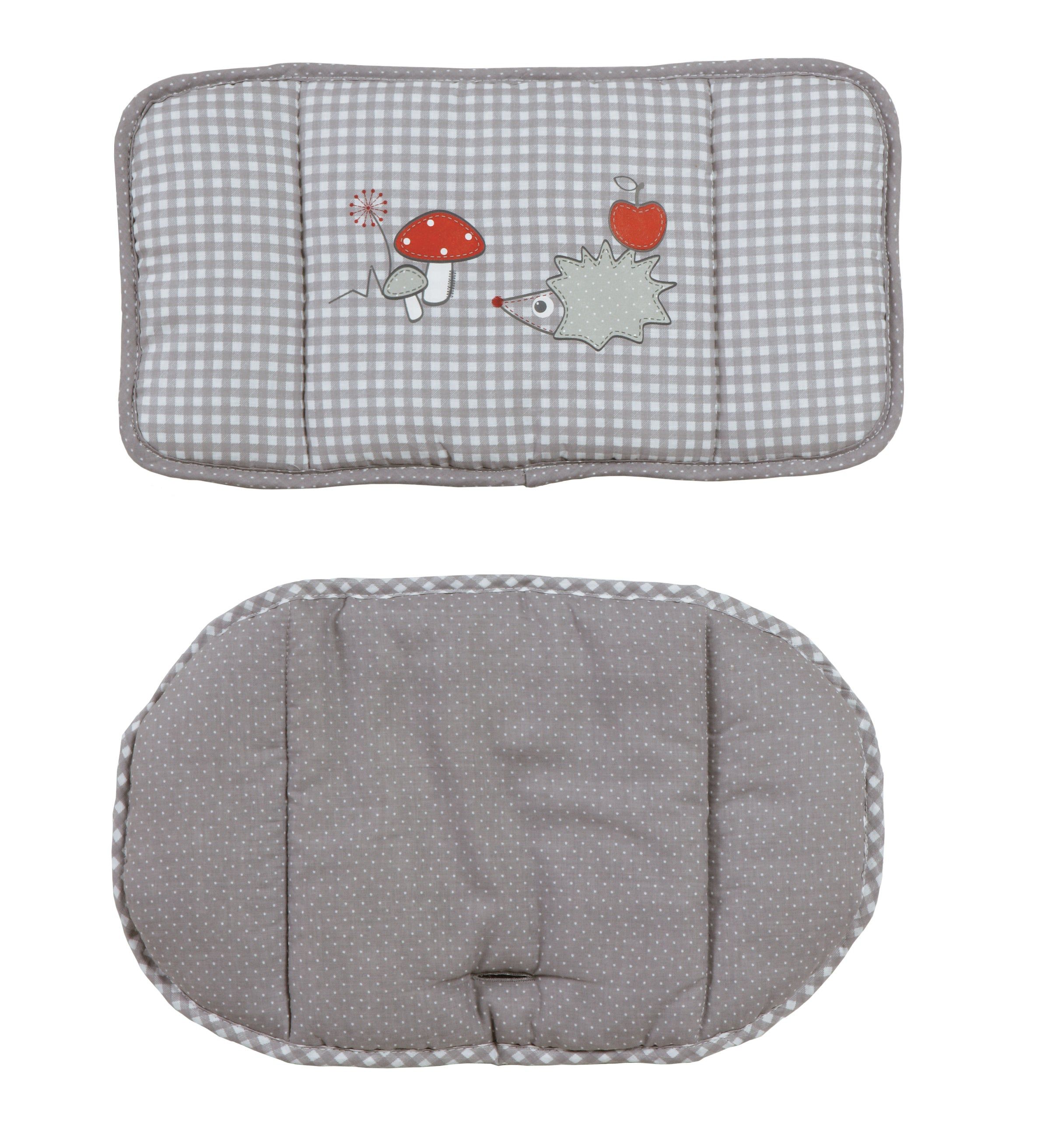 Zwei Teile eines Sitzverkleinerers. Oben: grau karierte Rückenlehne mit Igel-Applikation. Unten: gepunktete Sitzfläche.
