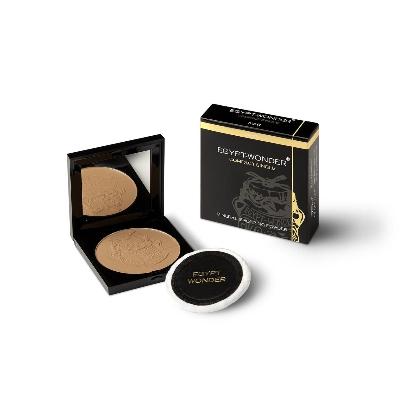 Kompaktpuder mit Spiegel und Applikator. Schwarze Verpackung mit goldener Schrift. Produktname: Egypt-Wonder Compact-Single "Sport".