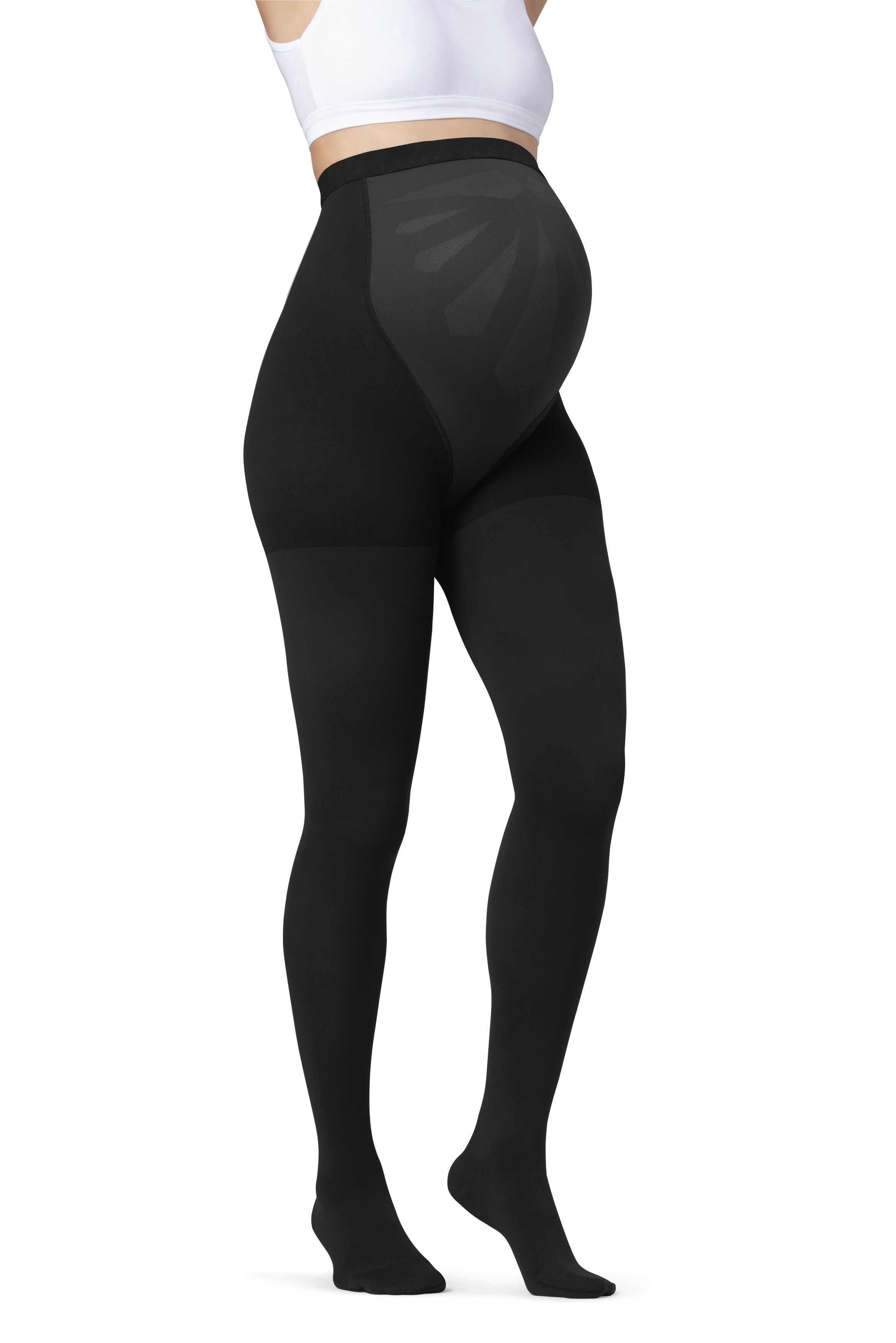 Schwarze JOBST Maternity Opaque Kompressions-Strumpfhose. Bauchbereich mit Muster. Seitliche Ansicht einer Person.