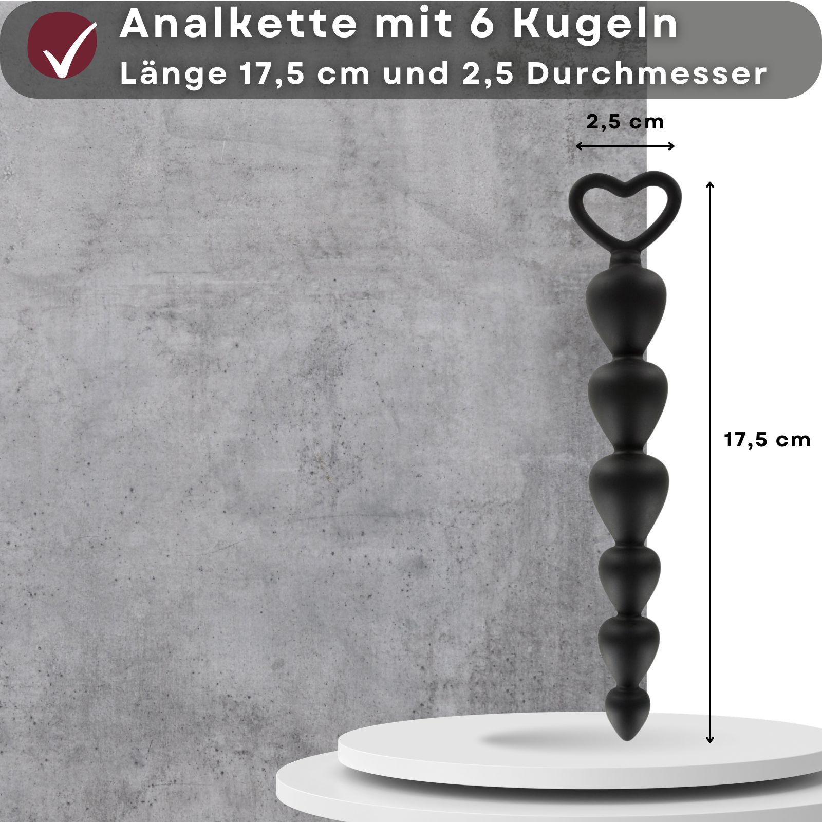 Schwarze Analperlenkette mit 6 Kugeln. Länge 17,5 cm, Durchmesser 2,5 cm, Herzgriff.
