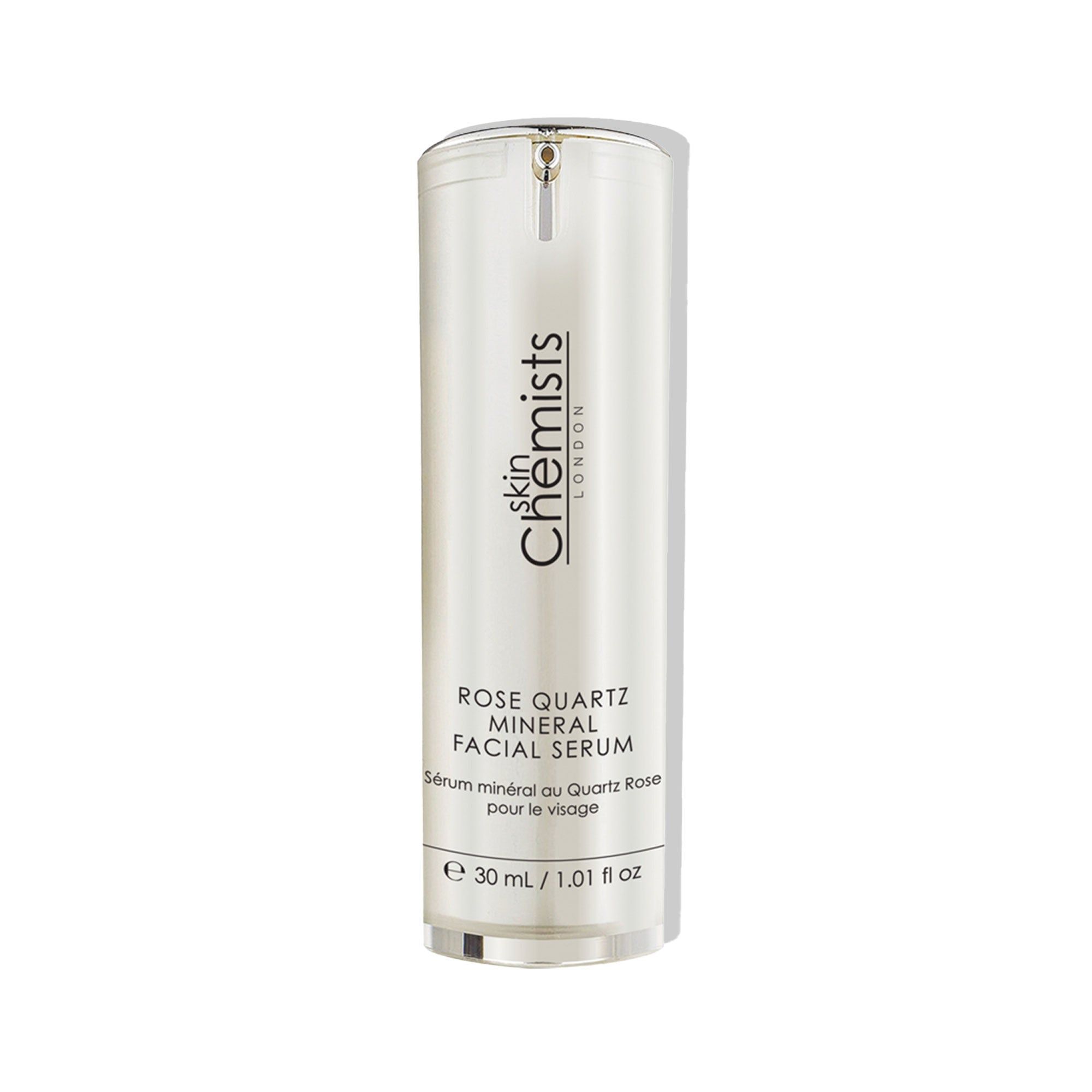 Zylindrische Flasche mit Serum. Aufschrift: skinChemists London, Rose Quartz Mineral Facial Serum. Volumen: 30 ml / 1.01 fl oz.