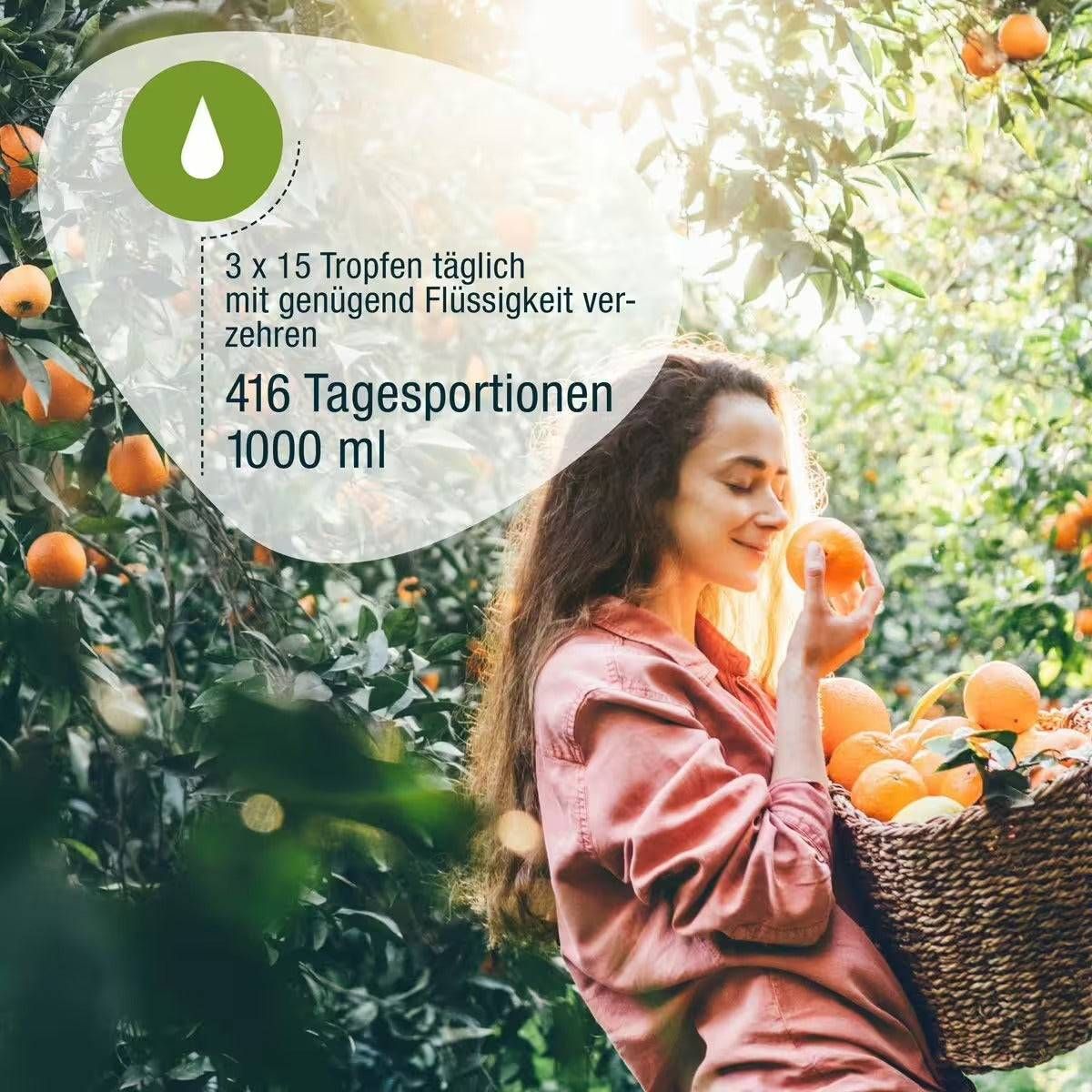 Frau mit Korb voller Orangen. Text: 3 x 15 Tropfen täglich mit genügend Flüssigkeit verzehren. 416 Tagesportionen, 1000 ml.