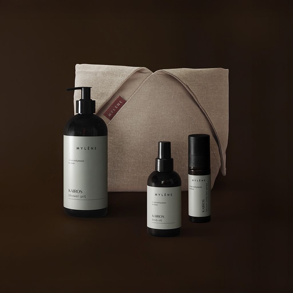 Kairos Duschgel, Körperöl und Deo-Roller mit Kosmetiktasche.