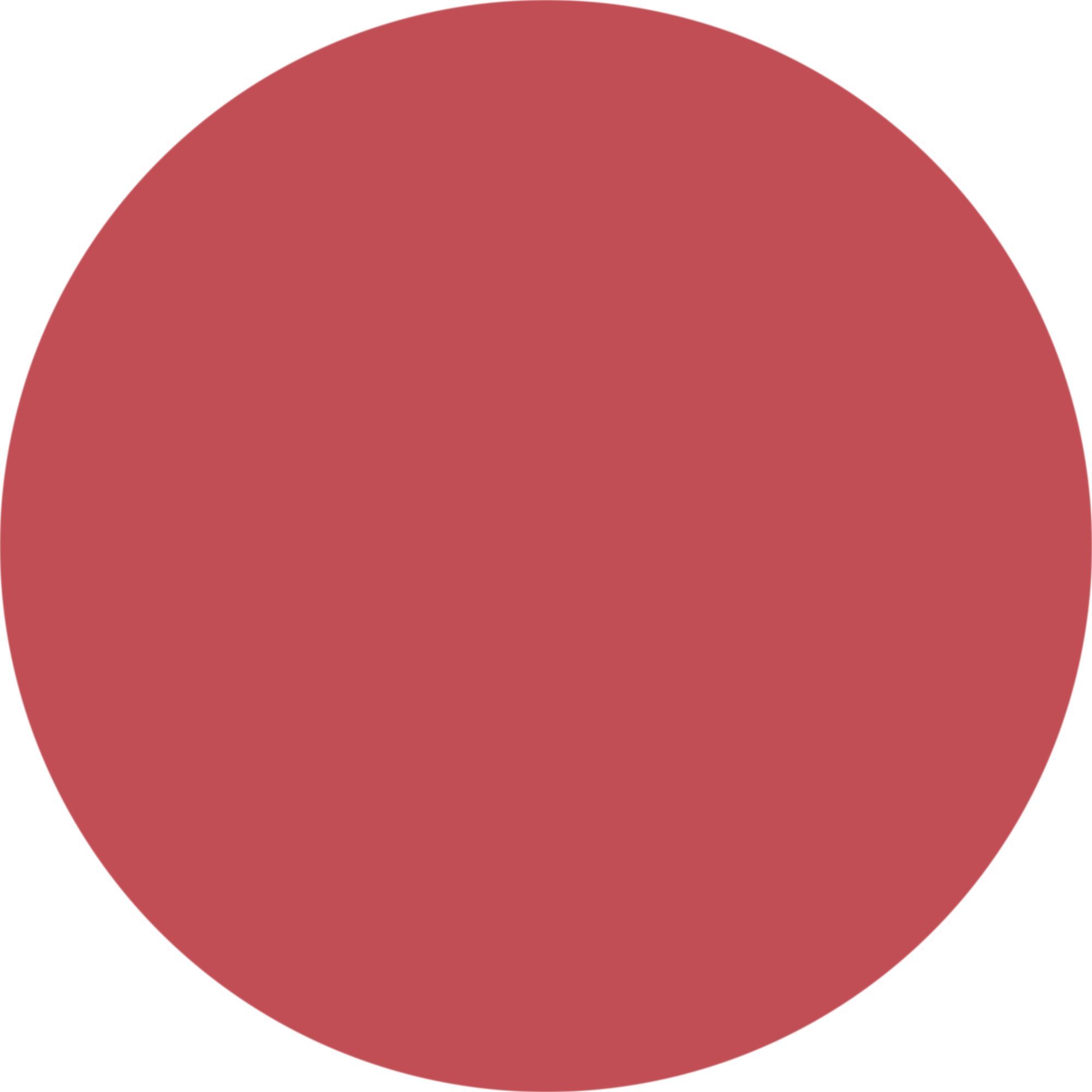 Kreisförmiger, rosaroter Lippenstift-Farbton auf weißem Hintergrund.