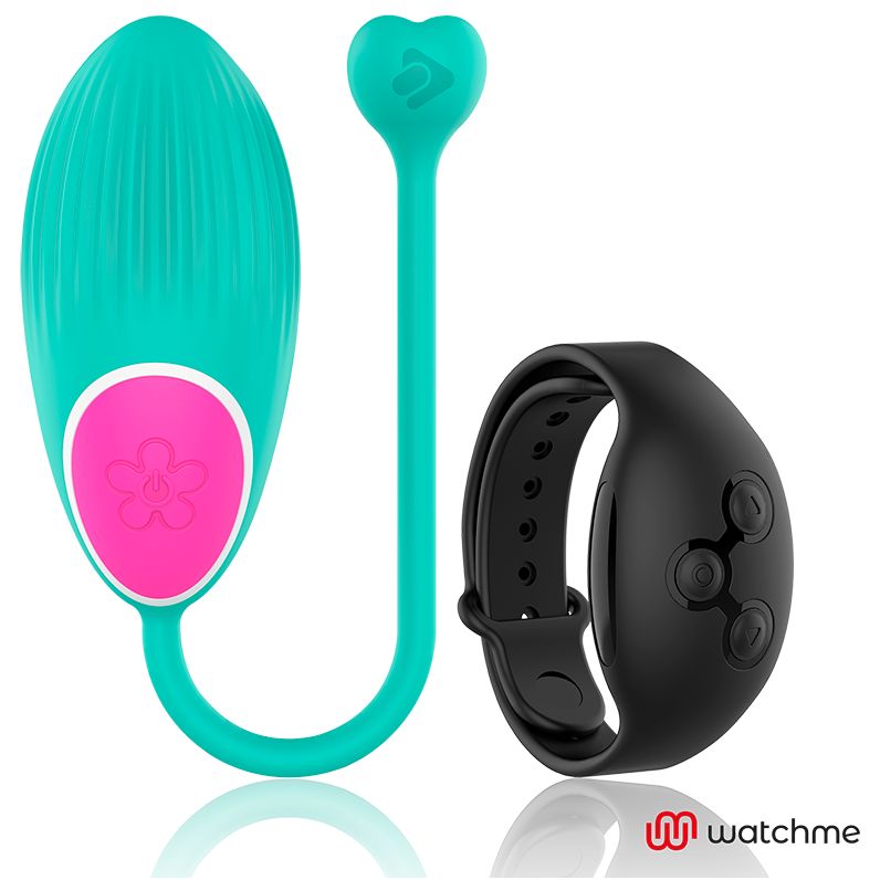 Türkis-farbenes Ei mit rosa Akzenten und schwarze Armbanduhr mit drei Knöpfen. Logo: watchme.