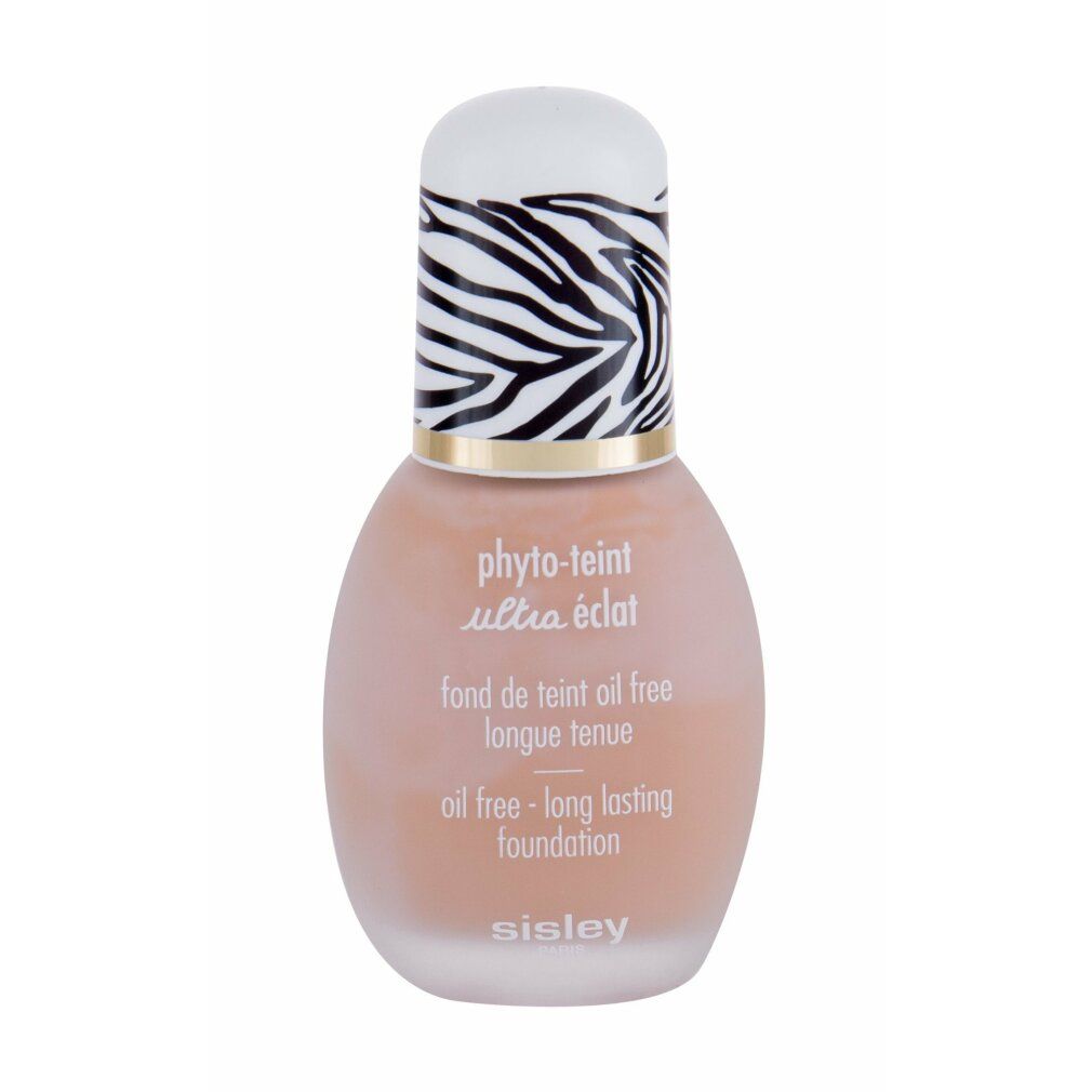 Flakon Sisley Phyto-Teint Ultra Eclat. Zebra-Muster auf dem Deckel. Text: oil free - long lasting foundation.