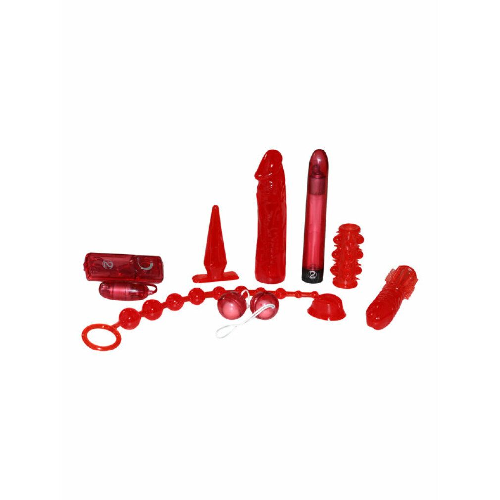 Rotes Set mit verschiedenen erotischen Hilfsmitteln, darunter Vibratoren und Kugeln.