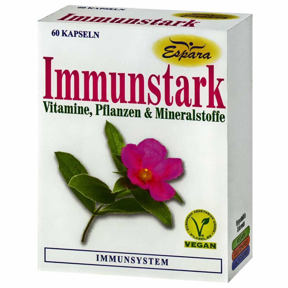 Karton mit Espara Immunstark Kapseln. Aufschrift: Immunstark, Vitamine, Pflanzen & Mineralstoffe. Vegan-Siegel. Abbildung einer Blüte.