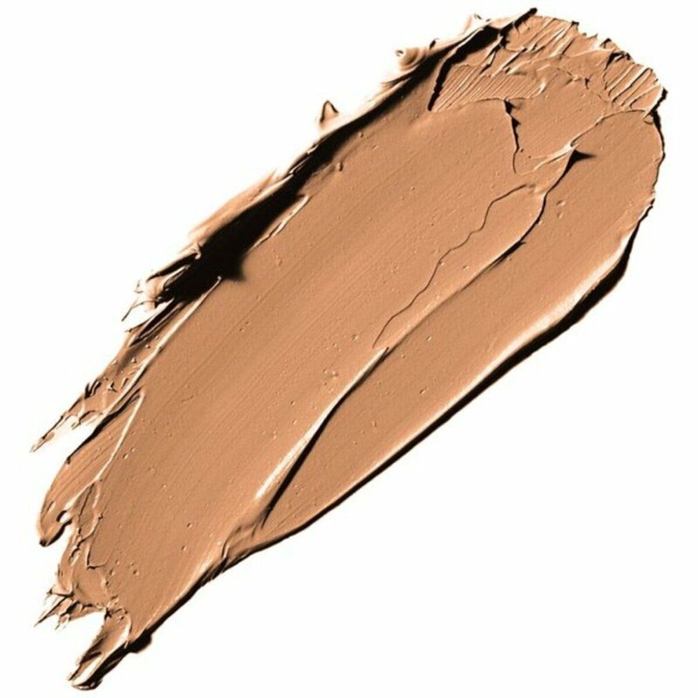 Beiger Make-up-Strich auf weißem Hintergrund. Textur mit sichtbaren Pinselstrichen.
