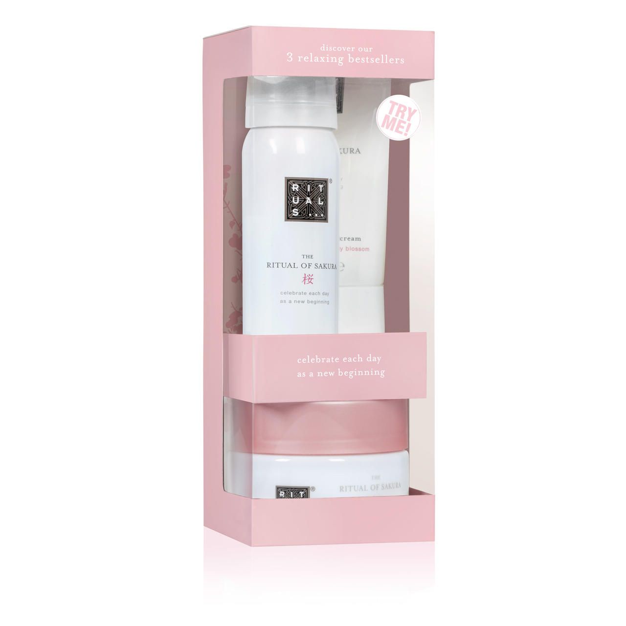 Geschenkset mit drei Produkten in rosa Verpackung. Enthält Duschschaum, Körpercreme und Körperpeeling. Mit Aufschrift "Try Me".