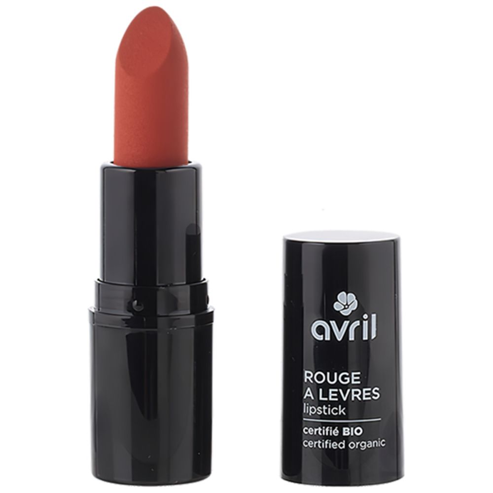 Offener schwarzer Lippenstift-Stift mit roter Spitze. Deckel daneben mit "Avril" Logo und Text.