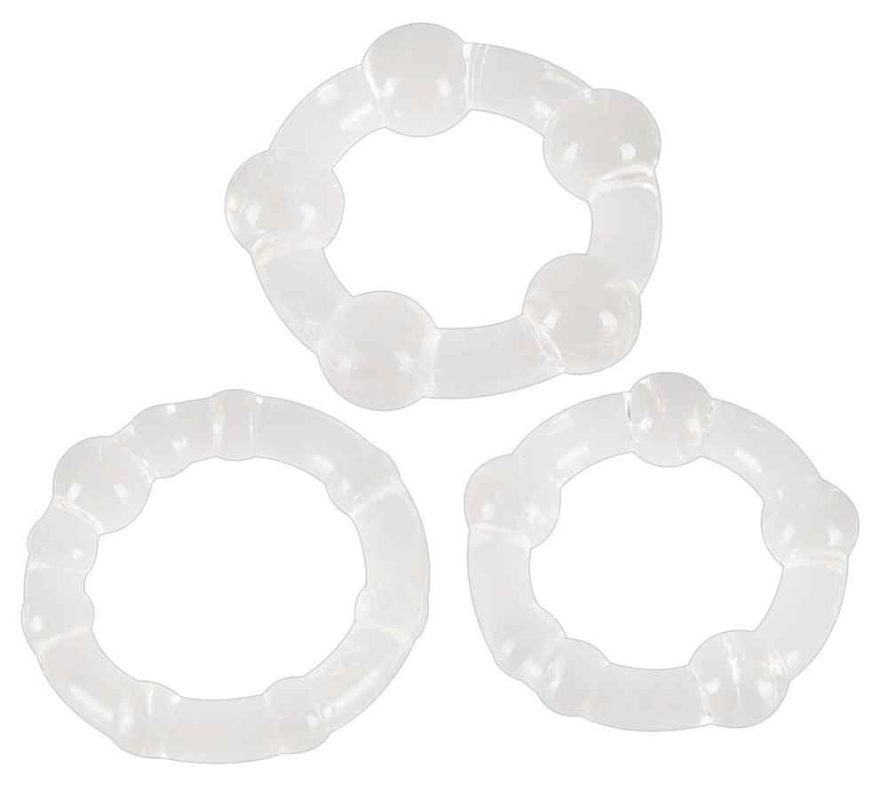 Drei transparente Penisringe. Sie sind aus Silikon gefertigt und haben eine runde Form mit unterschiedlichen Designs.