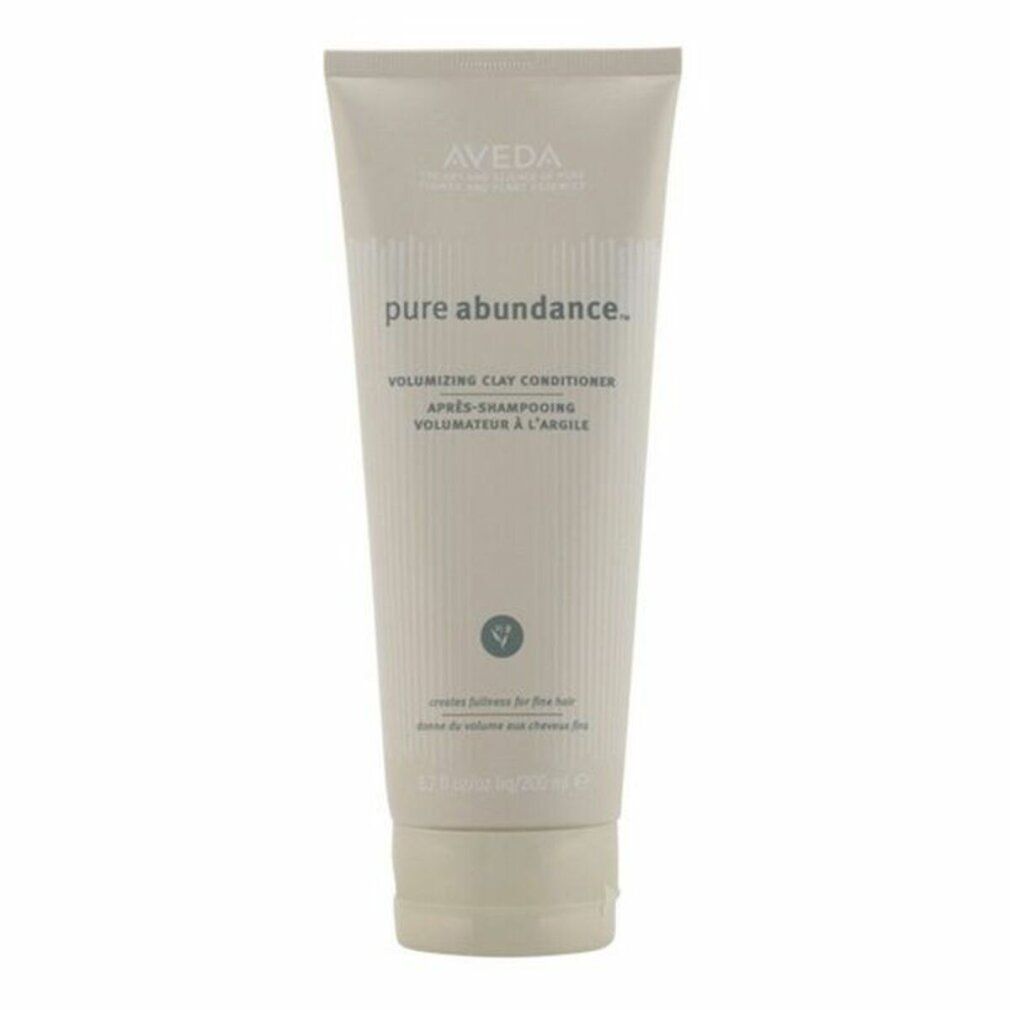 Beige Tube mit Produktnamen und Schriftzug. Aveda Pure Abundance Balsamo Volumizzante all'Argilla. Vertikale Streifen.