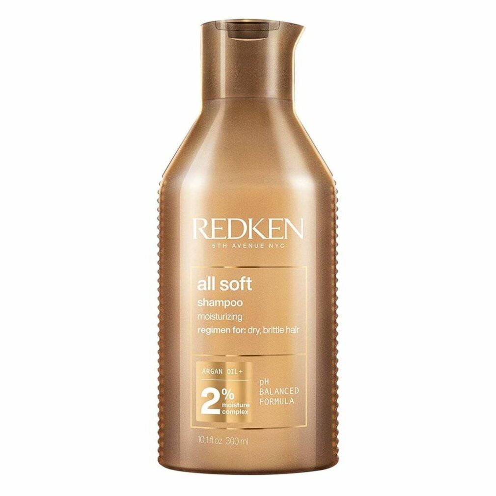 Goldfarbene Shampoo-Flasche. Aufschrift: "all soft shampoo". Enthält Arganöl und 2% Feuchtigkeitskomplex. pH-ausgeglichene Formel.