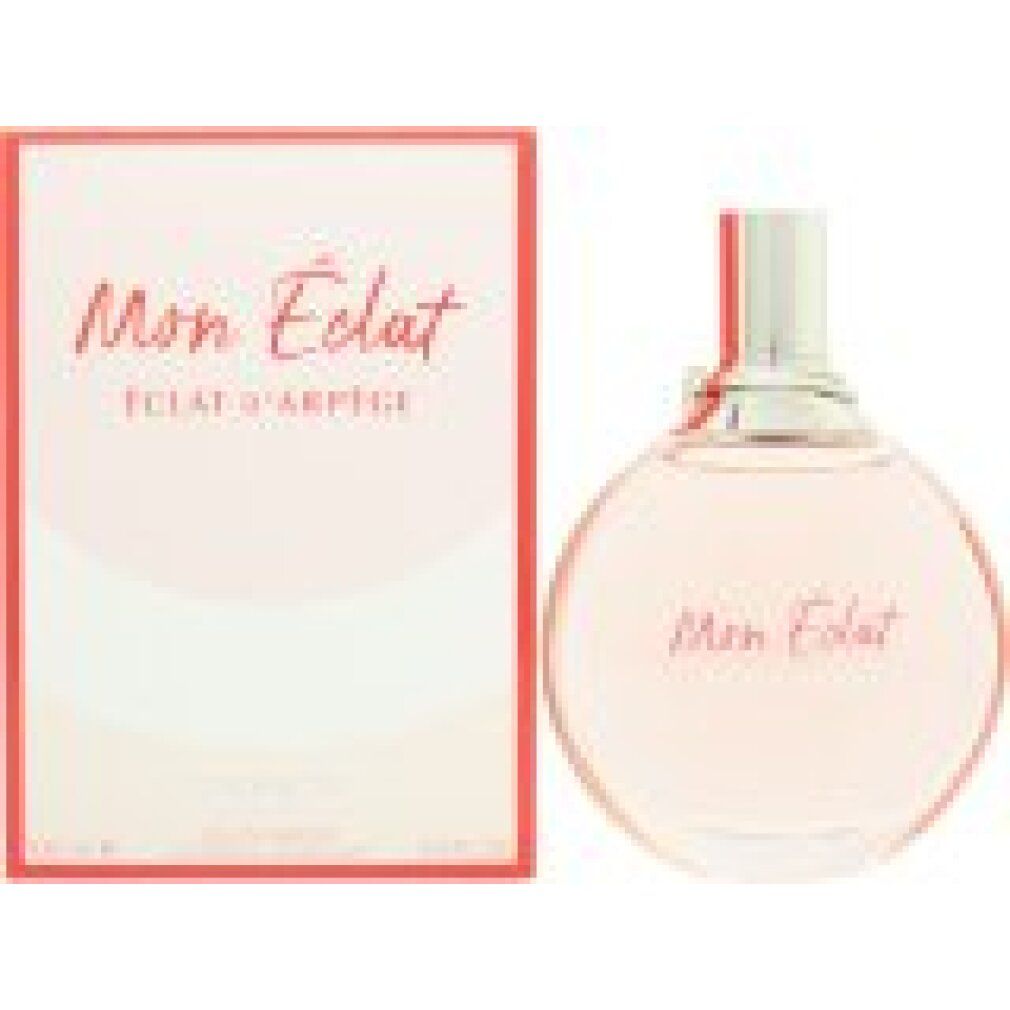 Lanvin Mon Éclat d'Arpège EdP Nat. Spray Flakon und Verpackung nebeneinander. Runder Glasflakon mit silbernem Verschluss und rosa Box.