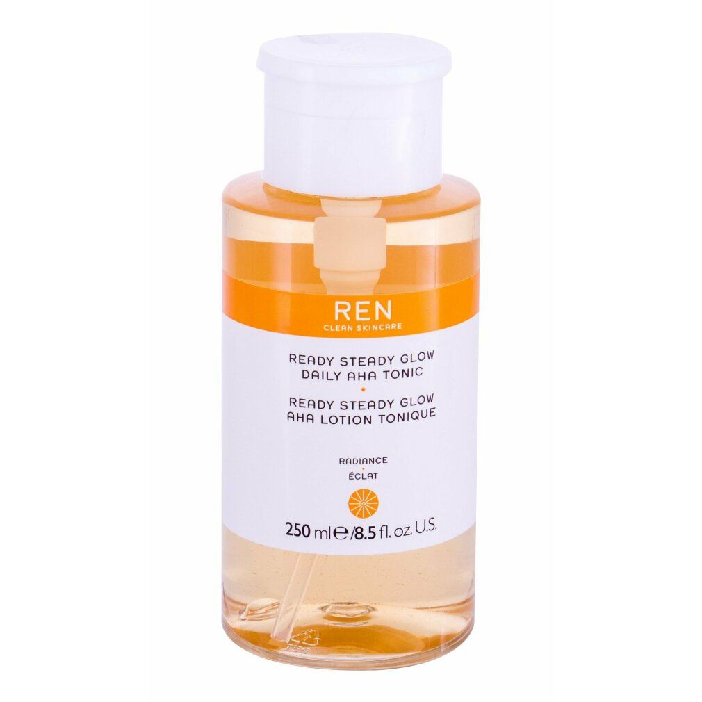 Flasche mit weißem Deckel und Pumpe. Aufkleber mit Text: REN, Ready Steady Glow Daily AHA Tonic. Orangefarbener Streifen.