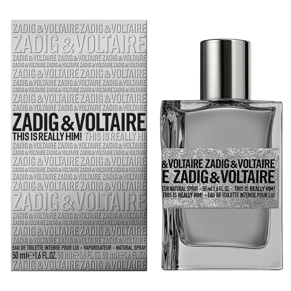 Zadig & Voltaire-Flakon und Verpackung. Rechteckiger Flakon, silberner Verschluss. Graue Verpackung mit Produktnamen. Klarer Flakon.