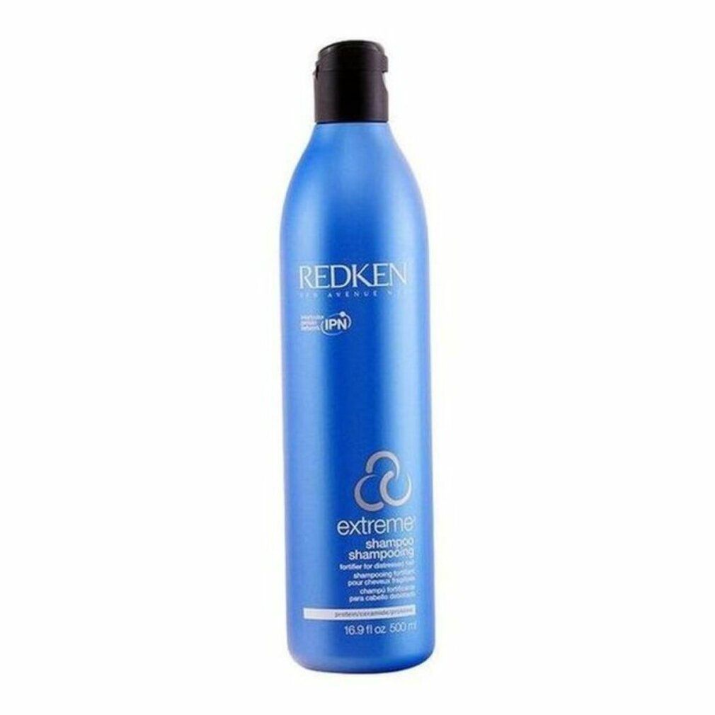 Blaue Shampoo-Flasche mit schwarzem Deckel. Aufschrift: Redken, Extreme Shampoo. Enthält IPN. 16.9 fl oz.