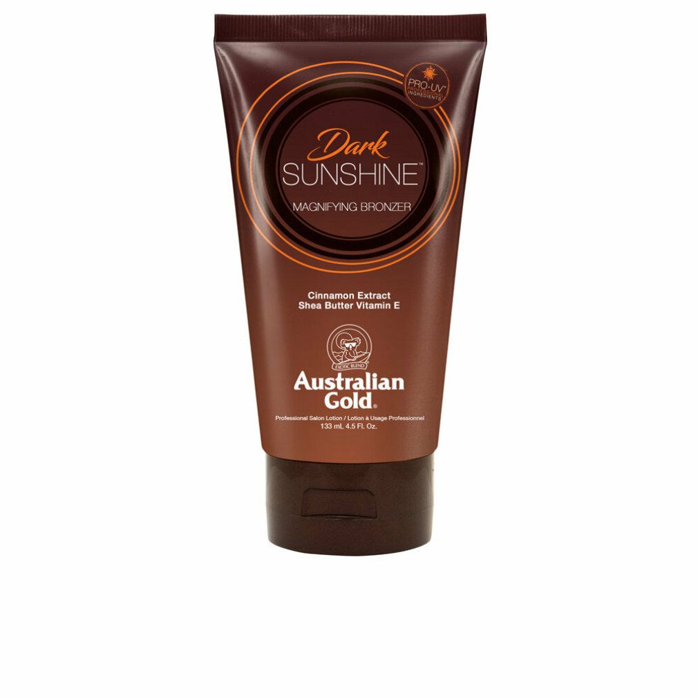 Braune Tube mit Aufschrift Dark Sunshine Magnifying Bronzer. Enthält Zimtextrakt, Sheabutter und Vitamin E. Marke: Australian Gold.