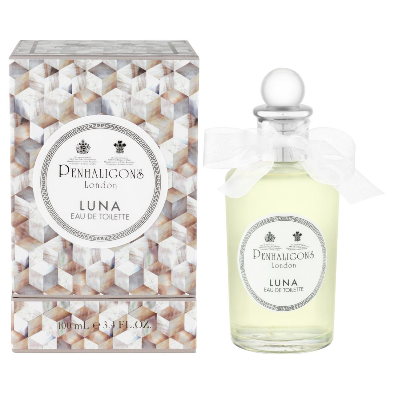 Penhaligon's Luna Eau de Toilette. Flakon mit weißem Band und Kappe, neben geometrischer Verpackung. Text: Luna, Eau de Toilette.