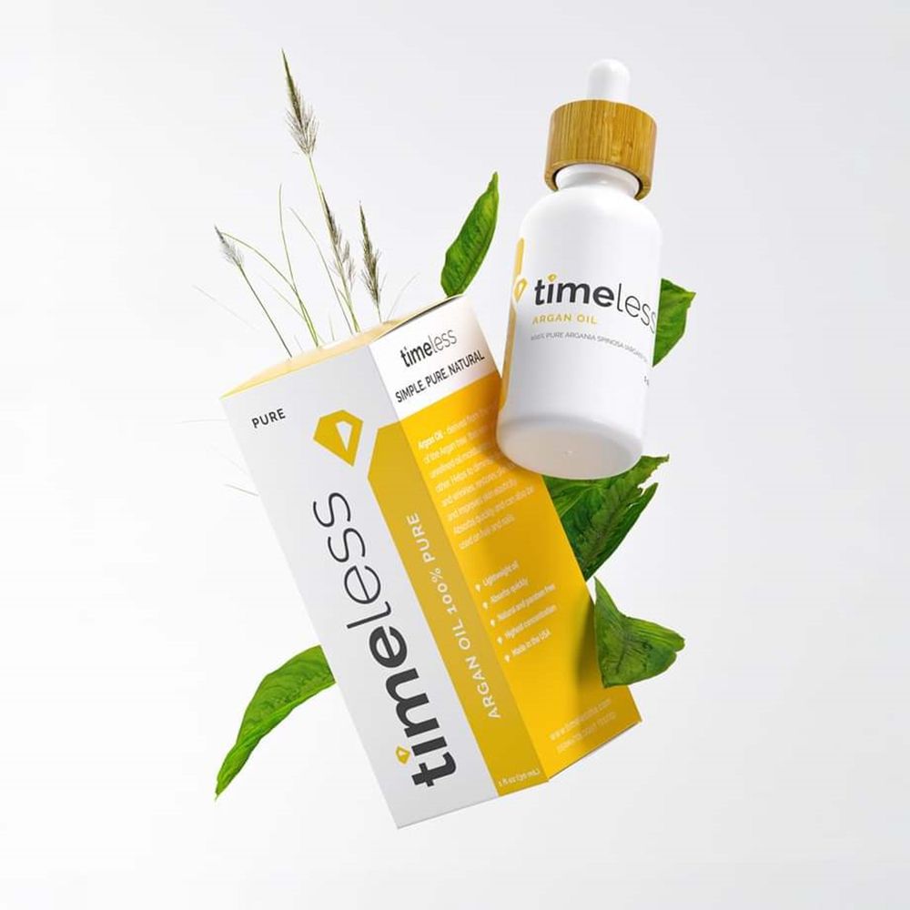 Produktverpackung und Flasche mit Öl. Gelbe Verpackung mit "timeless" und Produktnamen.