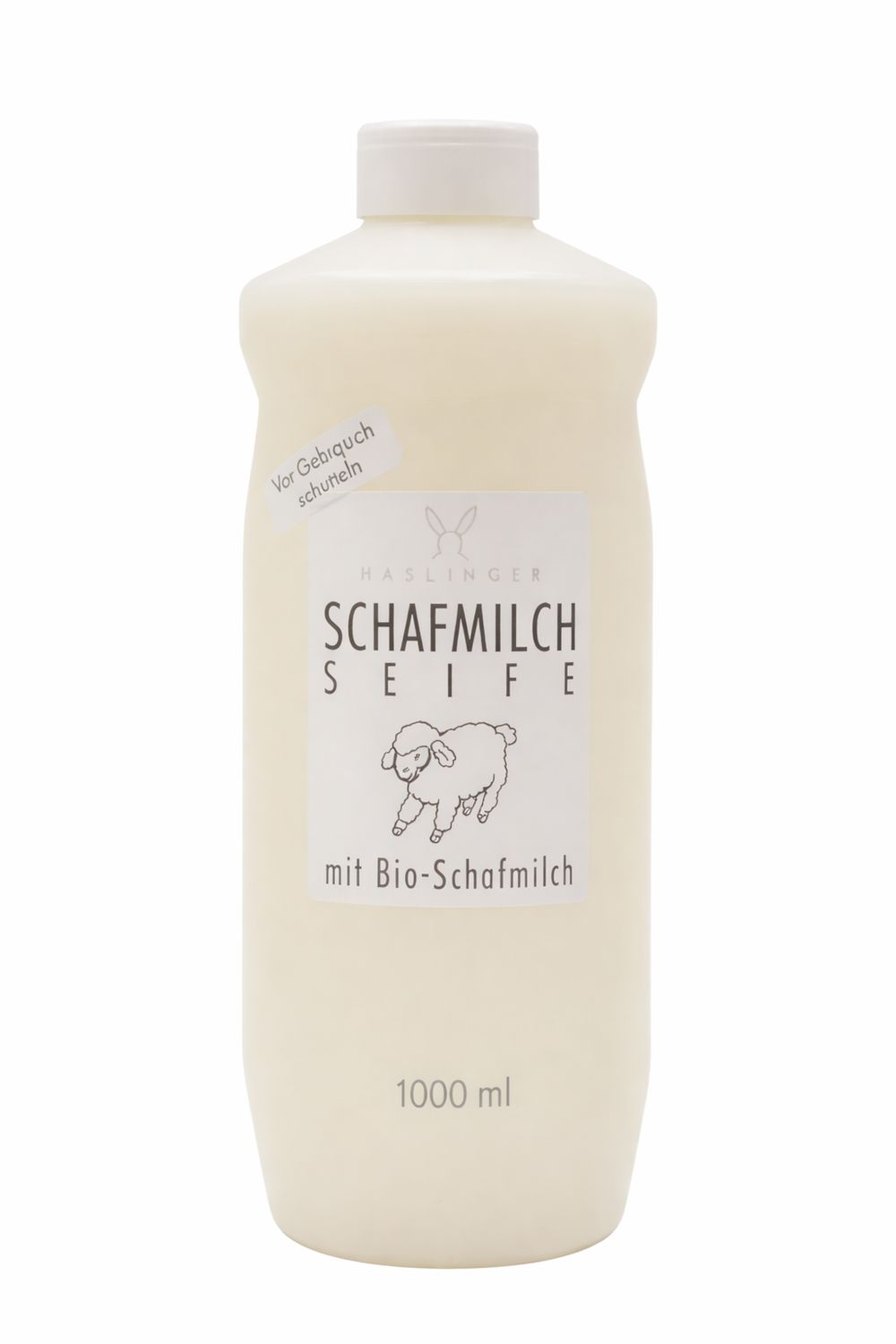Beige Flasche mit weißem Deckel. Aufkleber mit "Schafmilch Seife" und Schaf-Illustration. Text: "mit Bio-Schafmilch" und "1000 ml".