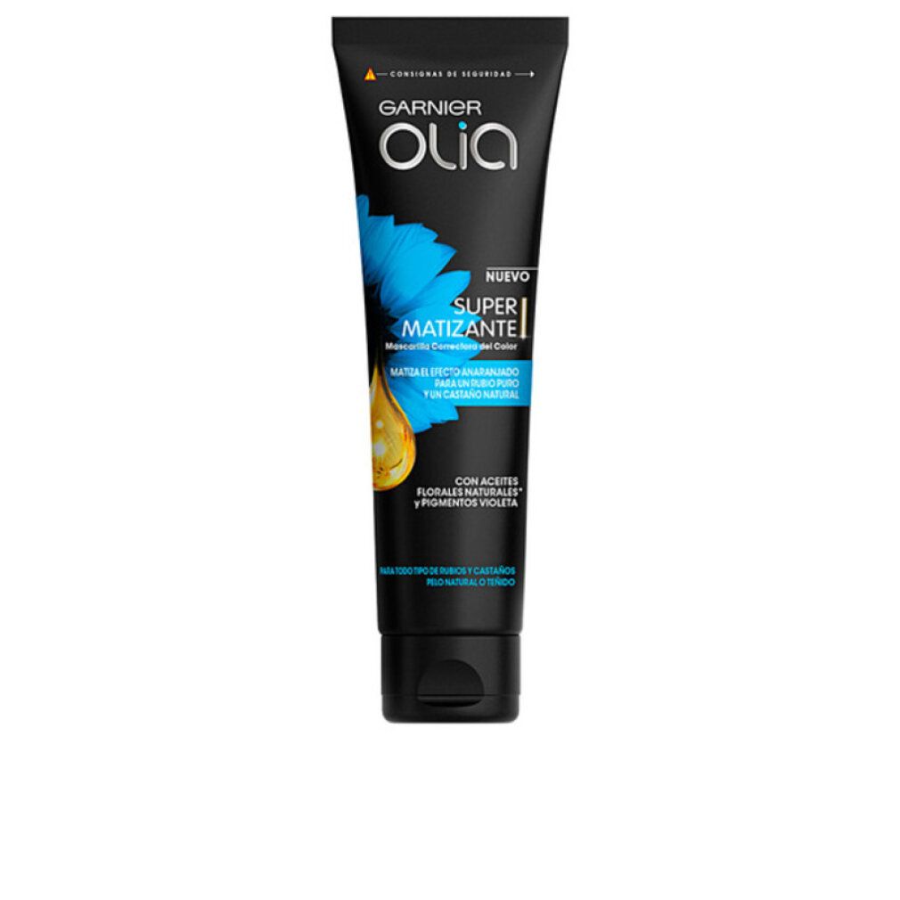 Schwarze Tube Garnier Olia Super Matizante Maske. Blaue Blume und gelber Tropfen. Text: Nuevo, Super Matizante, Mascarilla Correctora Color.