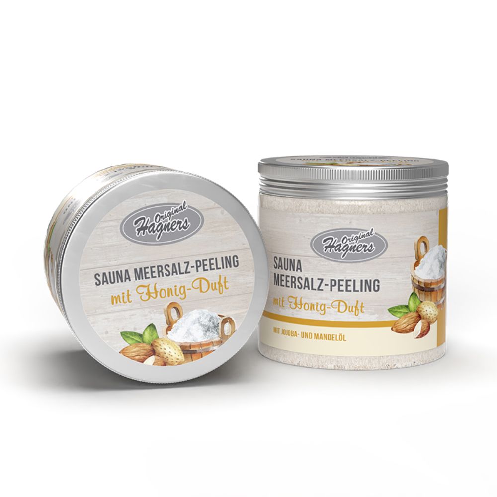 Zwei Dosen Sauna Meersalz-Peeling mit Honig-Duft. Aufschrift: Original Hagners. Runde Dose und zylindrische Dose mit Schraubverschluss.