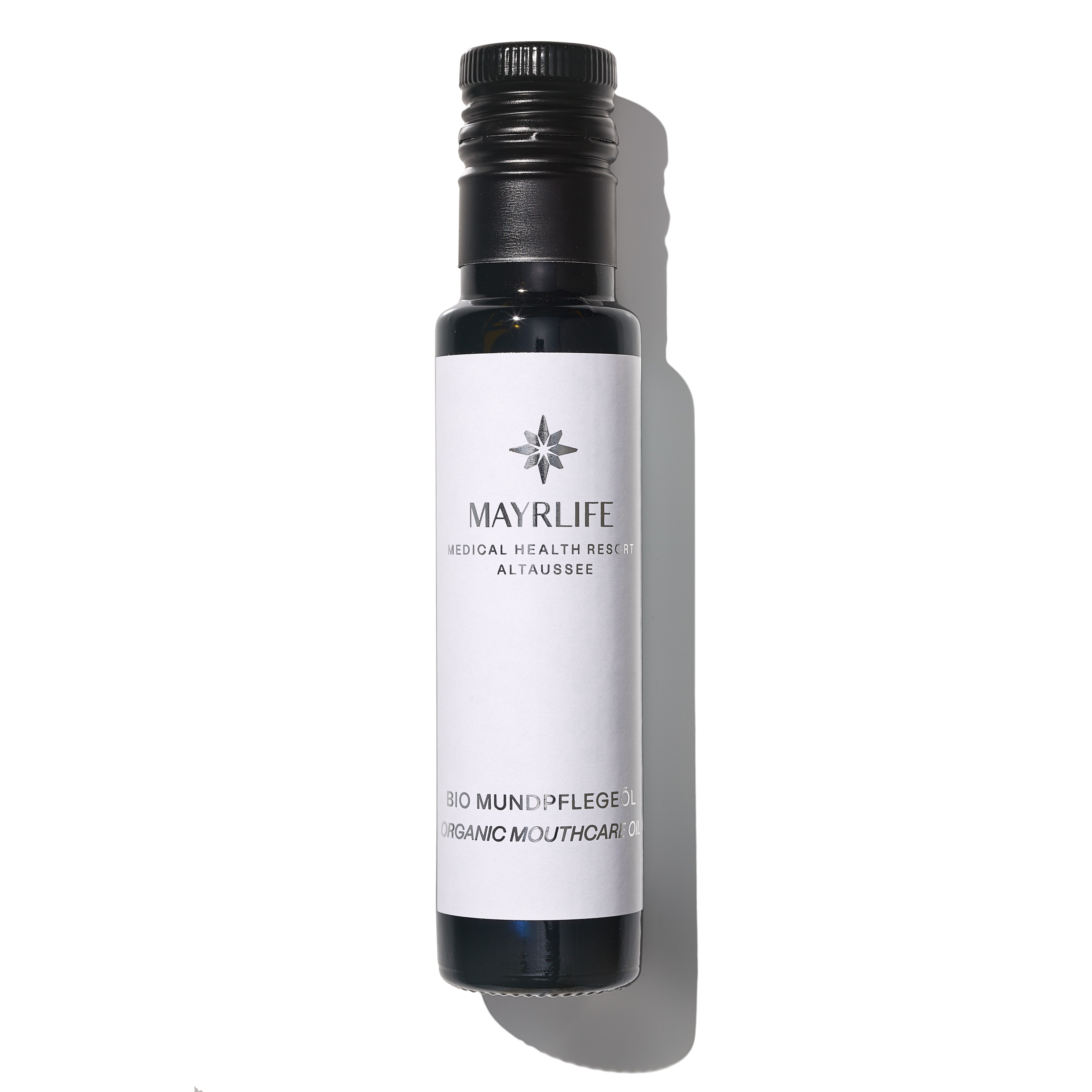 Fläschchen mit schwarzem Deckel und weißem Etikett. Aufschrift: MAYRLIFE, Bio Mundpflege, Organic Mouthcare.