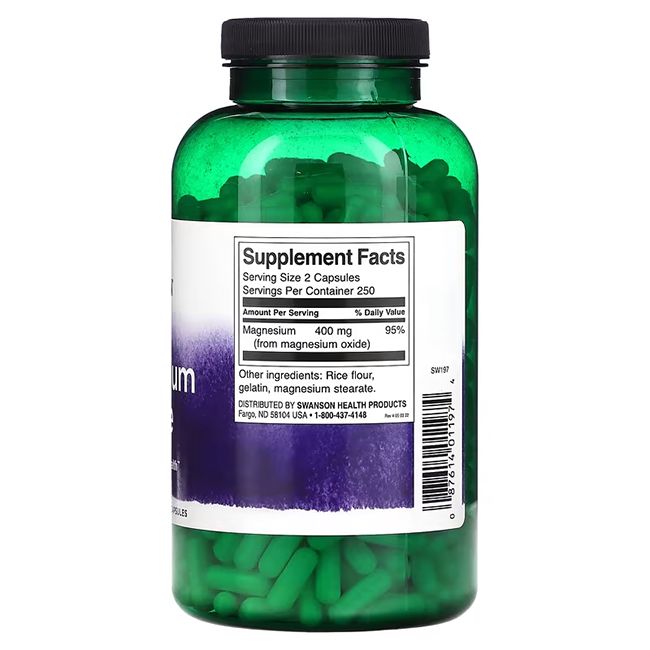 Grüne Flasche mit grünen Kapseln. Rückseite mit Nährwertangaben und Inhaltsstoffen. "SWANSON" und "Magnesium Oxide" sichtbar.