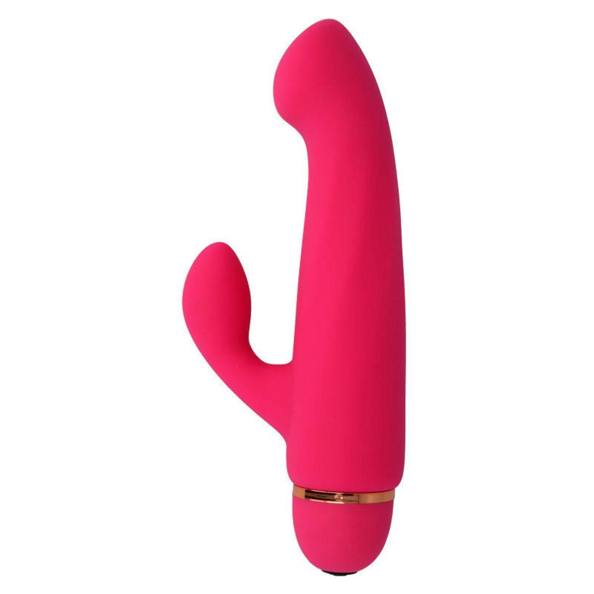 Pinkfarbener Vibrator mit gebogener Form und zwei Vorsprüngen. Goldfarbener Ring am unteren Ende.