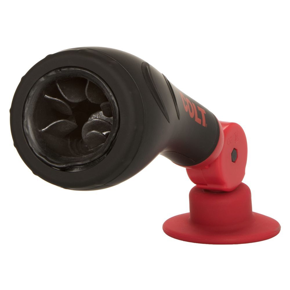 Schwarzes und rotes Masturbationsgerät. Schwarze Öffnung, roter Sockel. "COLT" Schriftzug.