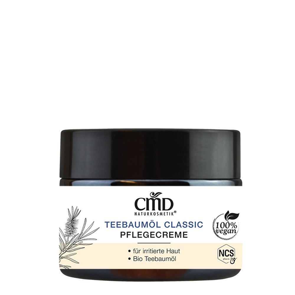 Creme-Tiegel mit schwarzem Deckel. Aufschrift: CMD Naturkosmetik, Teebaumöl Classic Pflegecreme. 100% vegan. Für irritierte Haut und Bio Teebaumöl.