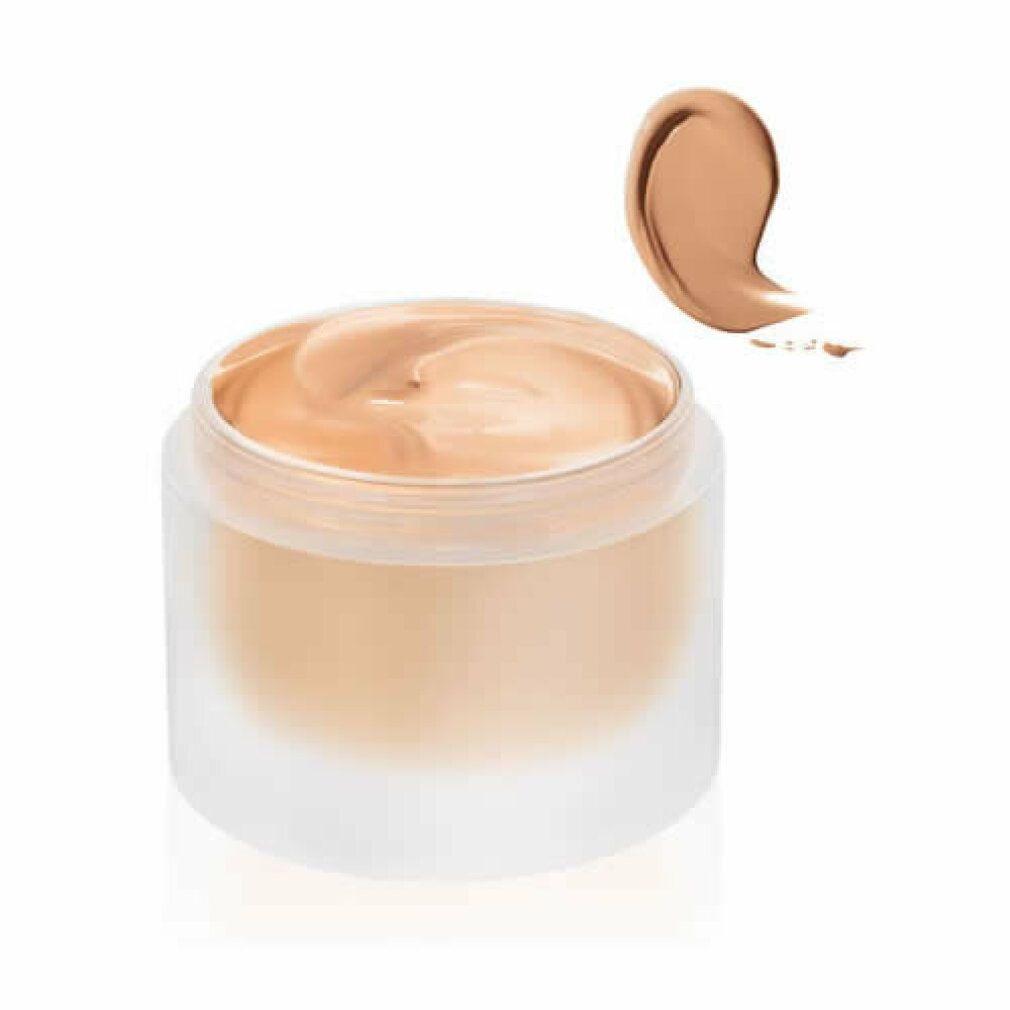 Beige Foundation in einem Glasbehälter. Daneben ein Farbmuster. 