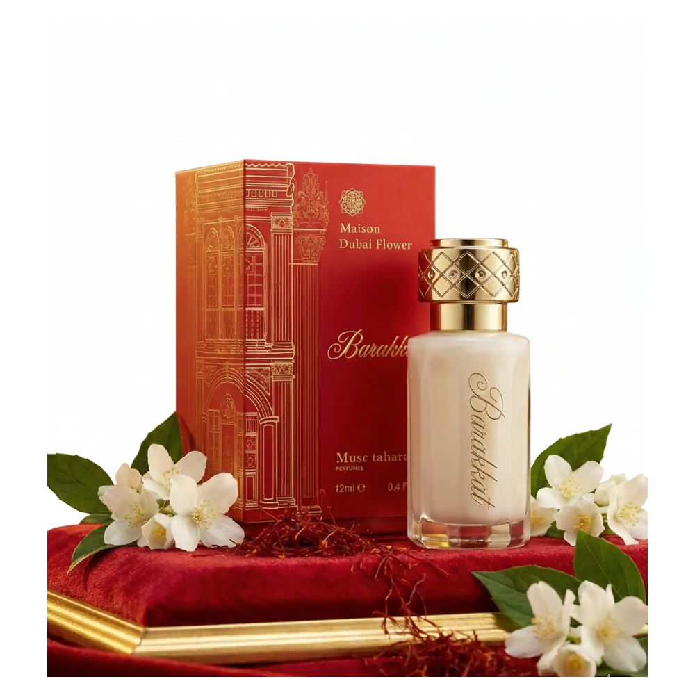 Parfümflakon neben roter Schachtel. Aufschrift "Maison Dubai Flower" und "Barakkat".