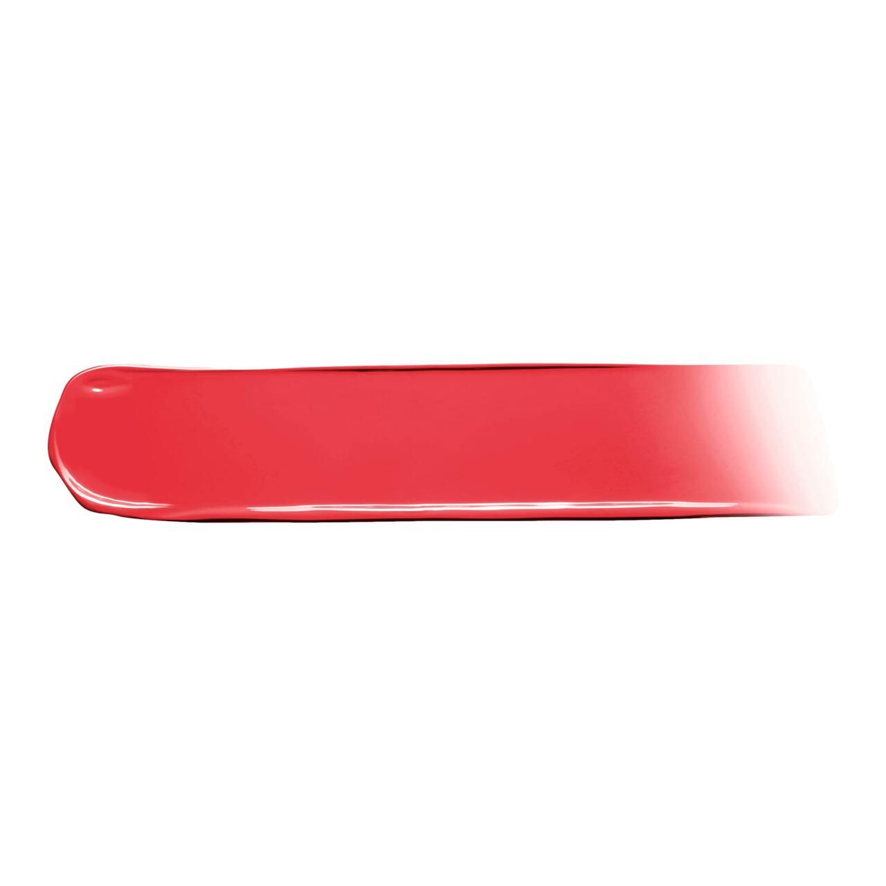 Ein pink-roter Swatch eines Lippenprodukts, der von satt auf transparent ausläuft.