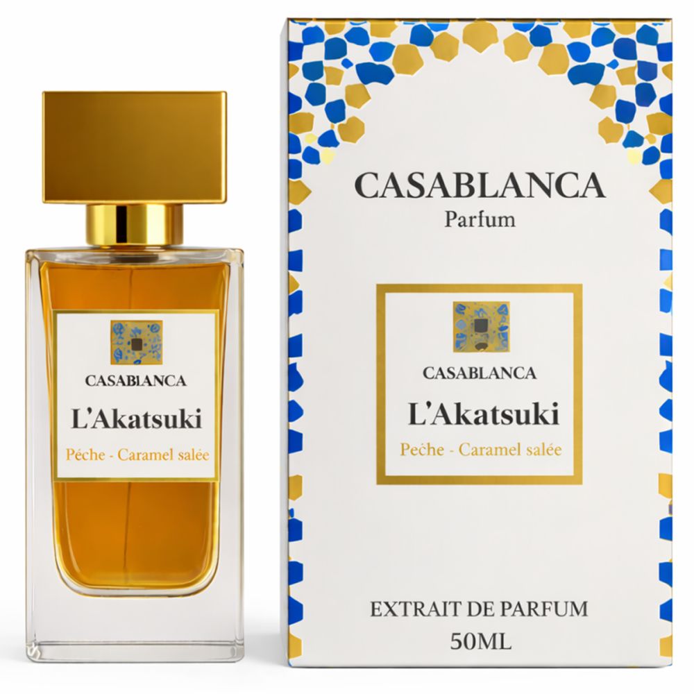 Parfumflakon und Verpackung. Flakon mit goldfarbenem Verschluss. Verpackung mit Produktnamen und Logo.
