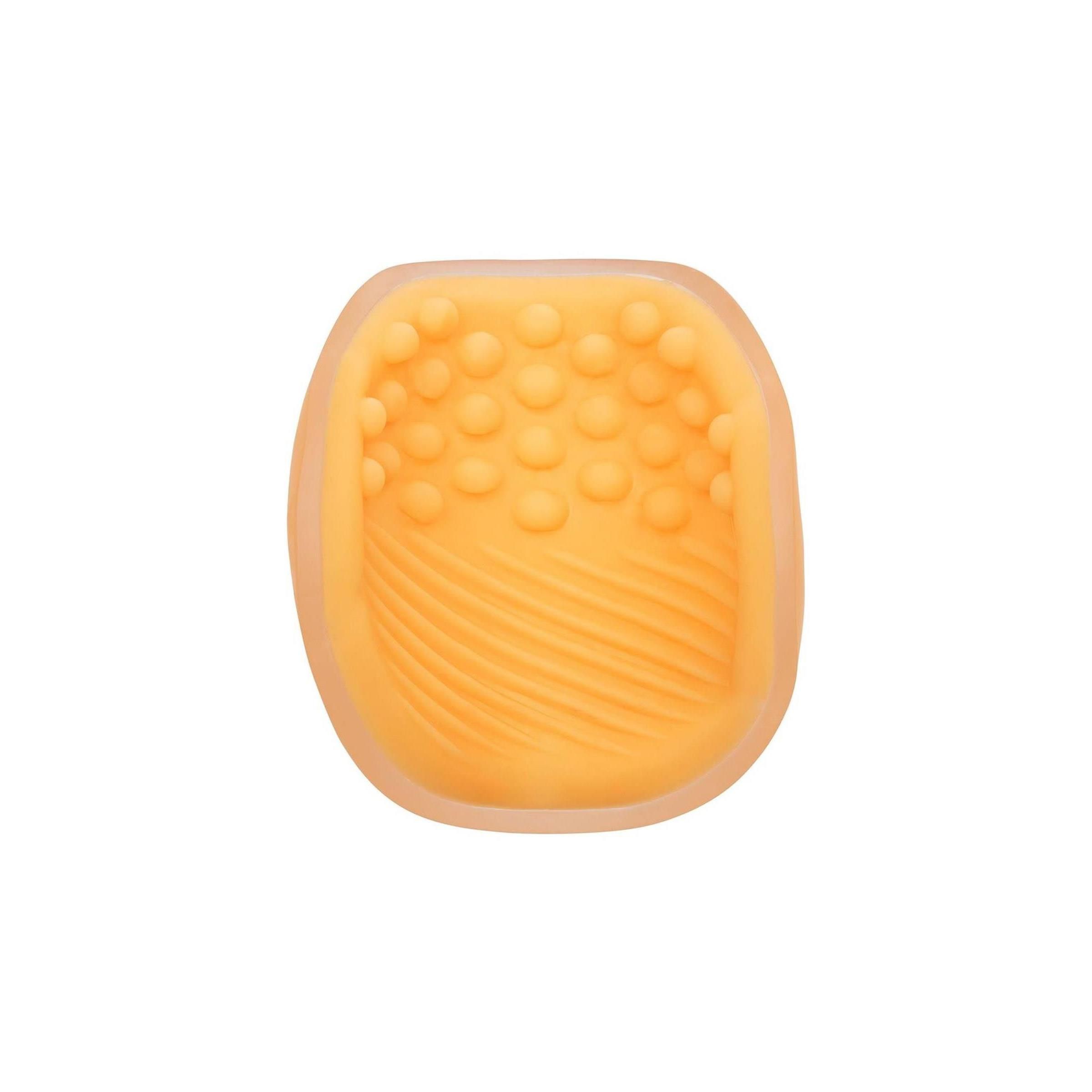 Gelbes, offenes Produkt mit genoppter und geriffelter Innenseite. Die Form ist rechteckig.